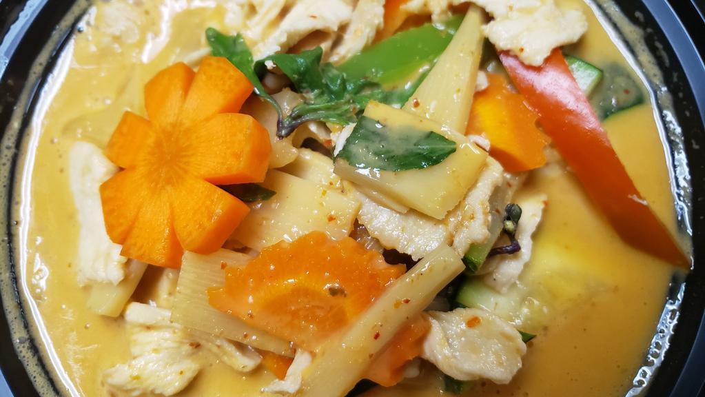 Red Curry · Red curry paste, carrot, bamboo, bell pepper, zucchini, basil, and coconut milk.