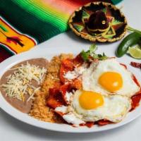 Chilaquiles & Eggs Plate · Choice of red or green sauce poured over crisp fried corn tortilla chips topped with cheese ...