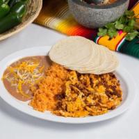 Breakfast Plate · Two scrambled eggs with choice of meat served with a side of refried beans, spanish rice, an...