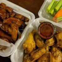 10 Pieces Hot Wings Combo · 10 classic (bone-in) wings with up to two flavors, crinkle cut fries, veggie sticks, one dip...