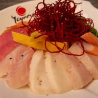 Chirashi Bowl · Bowl of sushi rice topped with a variety of sashimi.