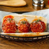 Marinara Meatballs Sandwich · Three meatballs covered in marinara sauce and melted Parmesan cheese on deli roll.