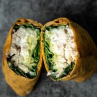 Watch Your Waist Wrap · Chicken, spinach, mozzarella, red onion, guacamole and Tzatziki sauce in a tomato basil wrap...