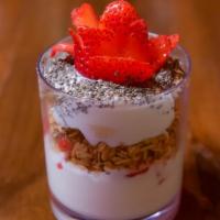 Yogurt Parfait · Yogurt, granola and fruit layered in a glass