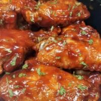 Bbq Wings · Tossed in our sweet bbq sauce