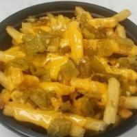 Green Chile Fries Sm · Topped with cheese wiz and green chile