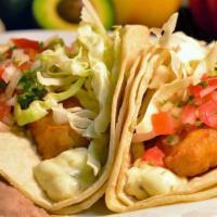 Two Fish Tacos · Fried fish tartar sauce lettuce and pico de gallo.