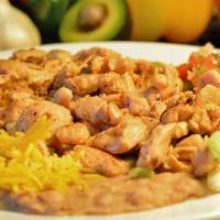 Taco De Pollo Asado · Guacamole and pico de gallo.