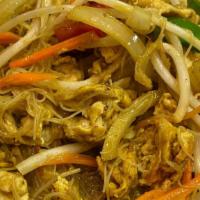Singapore Noodles · Stir-fried vermicelli noodles with egg, carrots, sprout, snow peas and bell peppers.