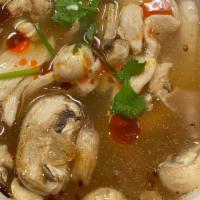 Tom Yum Chicken Or Tofu (Bowl) · Vegetarian. Hot and sour soup with mushrooms, lemon grass, chili paste and lime leaves. (Sub...