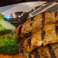 Grilled Chicken Teriyaki With Jasmine Rice · Slowly grilled marinated chicken breast on skewers with homemade teriyaki sauce. Served with...