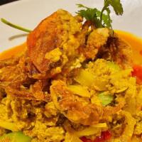 Soft  Shell Crab Curry With Jasmine Rice (Poo-Pad-Pong-Kari) · Crab stir fried with special thai yellow curry powder, egg, celery, onion, bell, cilantro, m...