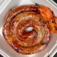 Homemade Grilled Sausage · 1 pound of seasoned ground meat that has been wrapped in a casing.