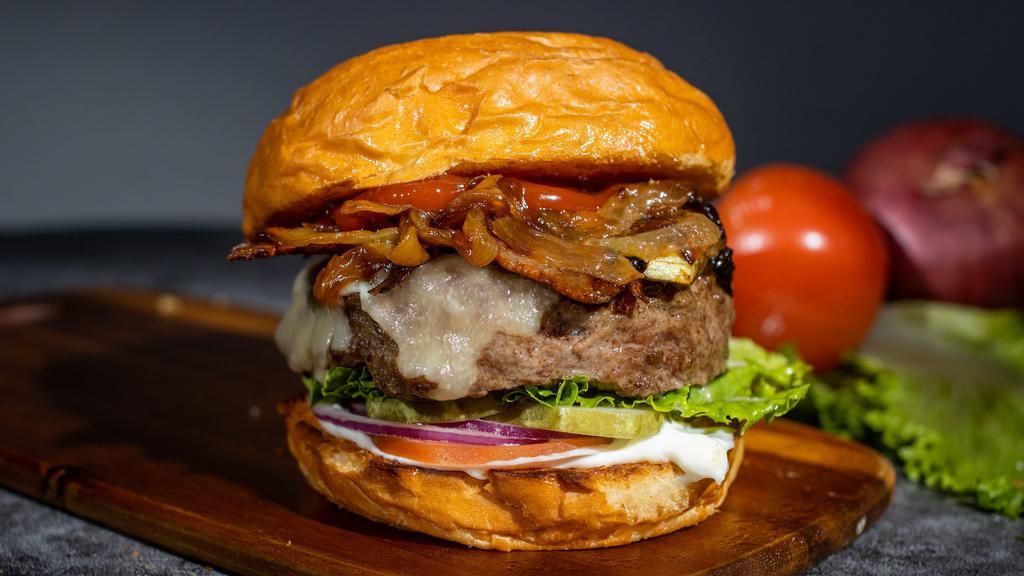 Washington Park Bacon Burger · One third pound grilled patty served with delicious bacon, ketchup, mustard, mayo, lettuce, onion, pickle, and tomato and smothered with our delicious blue cheese sauce