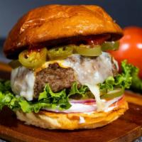 Jazzy Jalapeno Gardens Burger · Spicy jalapeno paired with our grilled patty, served with ketchup, mustard, mayo, lettuce, o...