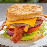Double Bacon Cheeseburger · Comes with house dressing, lettuce, tomato, and onions.