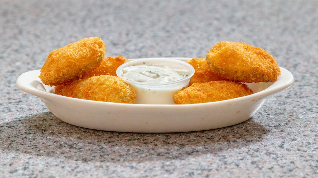 Cream Cheese Poppers · Mild jalapeño pepper halves filled to the max with silky smooth cream cheese, then coated in a crunchy potato batter.