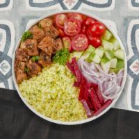 Chunky Shish Kebab Plate · Hearty chicken kabobs, hummus, green salad, rice, and warm pita bread.