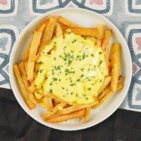 Melt On Me Cheese Fries · Crispy golden fresh made french fries smothered in creamy cheese.