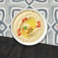 Have A Hummus · (8 oz.) Hearty mashed garbanzo bean dip served with warm pita bread.