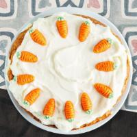 Carrot Bunch Cake · Hearty house made carrot cake with a sweet butter cream frosting.