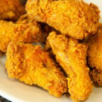 Chicken Wings (8) · Medium spicy. Eight pieces. Seasoned chicken wings deep-fried in soybean oil.