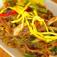 Jab-Chae · Korean potato starch noodles, stir-fried with veggies and beef, seasoned in soy sauce.