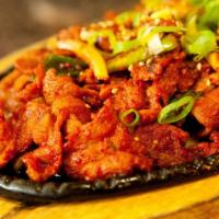 Spicy Pork Bulgogi · Spicy. Korean BBQ pork loin marinated in spicy bulgogi sauce. Served with rice and side dish...