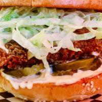 Fried Chicken Sandwich · w/ buttermilk iceberg slaw, Crystal hot sauce, Duke's mayo, and pickles