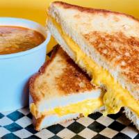 Grilled Cheese · w/ Tillamook cheddar (add tomato soup $3)