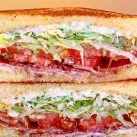 Blt · on Texas toast w/ shredded iceberg, bacon, tomato, and Duke’s mayo