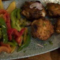 Murg Tandoori · Gluten free. Chicken legs, ginger garlic blend and tandoori spices.