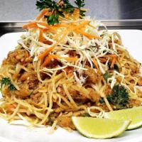 Shan Noodles Salad · Shan traditional spiced curried chicken mixed with rice noodle, cilantro, cabbage, carrot, g...