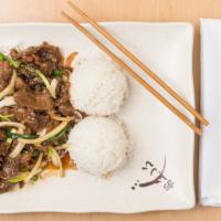 Mongolian Beef · Most popular. Sliced tender beef with green onion garnished with crispy rice noodle, Served ...