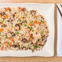 House Fried Rice · Most popular. Chicken, beef, pork and shrimp with egg, peas, carrots and onions.