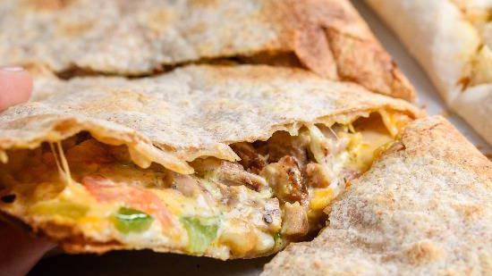 Breakfast Quesadilla · Choice of one meat. Half or full size, served with melted cheddar cheese, your choice of meat, eggs, potatoes, tomatoes, onions, jalapeno, served with a side of salsa.