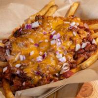 Chili Cheese Fries · Crinkle cut fries, with nacho cheese and red or green chile, sprinkled with cheddar cheese.