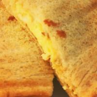 Grilled Cheese Panini · On sourdough toasted with provolone  cheese.