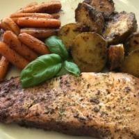 Seared Salmon · Slow-cooked in garlic wine then seared, served with roasted potatoes and baby carrots. This ...