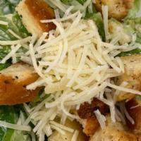 Caesar Salad · Romaine lettuce, parmesan cheese, house garlic croutons, tossed in house caesar dressing.