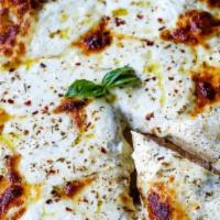 White Pie (Small 12'') · No red sauce, mozzarella, fresh ricotta and a pinch of pecorino Romano cheese.