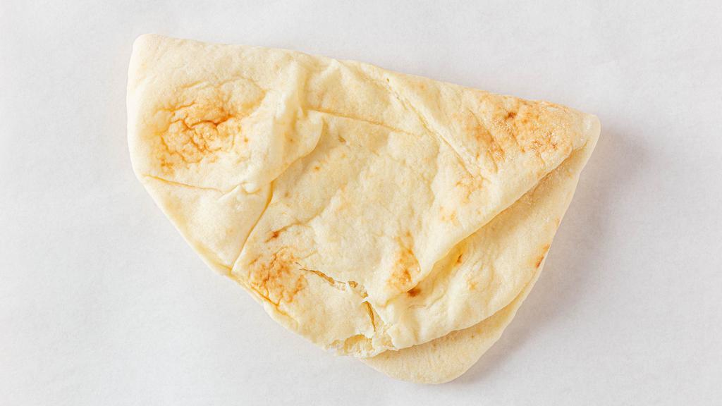 Naan · One piece of oven-baked flat bread.