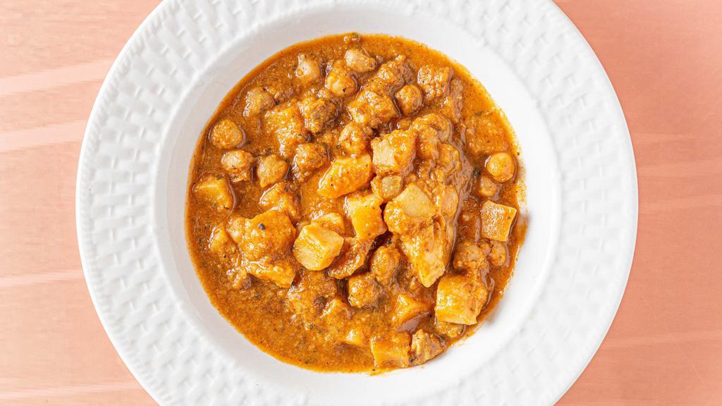 Bombay Potatoes · Slow-cooked potatoes and chickpeas with spices in a zesty tomato sauce.