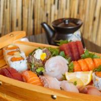 Sushi & Sashimi Combo · Five pieces, sushi, 13 pieces sashimi and tuna roll.