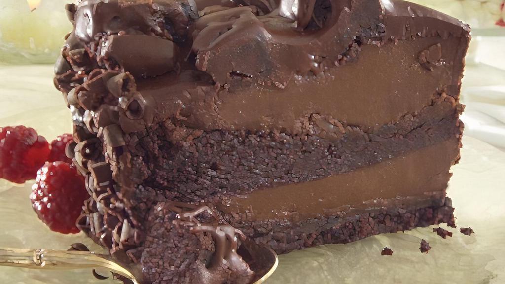 Chocolate Lovin Spoonful Cake · A giant mouthful of chocolate pudding between two layers of dark, moist chocolate drenched chocolate cake.