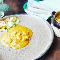 Shiro · Seasoned chickpea flour cooked in mild sauce, served in a special clay bowel. Add proteins a...