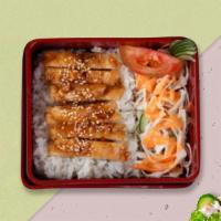 Teriyaki Cluckin' Bento Box · Juicy chicken teriyaki served with aromatic short-grained rice, freshly made edamame, side o...