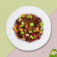 Cluckin' Kung Pao · Kung Pao chicken served with aromatic short-grained rice, freshly made edamame, side of dump...