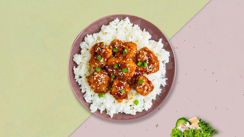 Sesame Street Chicken · Sesames chicken served with aromatic short-grained rice, freshly made edamame, side of dumplings and fruit with the choice of miso soup or salad.