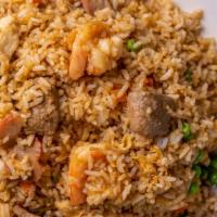 House Special Fried Rice · Includes shrimp, chicken, beef and pork.